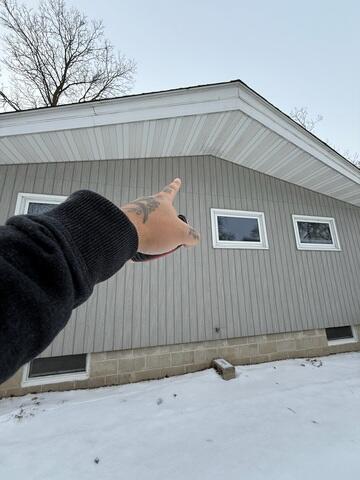 Before: Romeo, one of our Design Specialists, recommended securing a Radon Mitigation System outside the home.