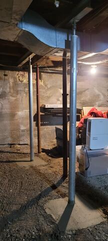 Smart jacks installed and crushed stone base covered and smoothed over with concrete.