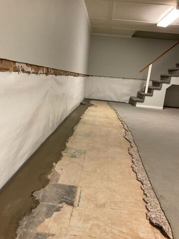 WaterGuard is an interior drainage system designed to capture water at the wall-floor joint and direct it to the sump pump. Installed discreetly, it keeps the basement dry without disrupting the space.