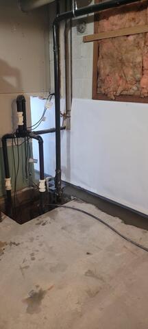 AFTER - We installed cleanspace and water guard subfloor drainage system.