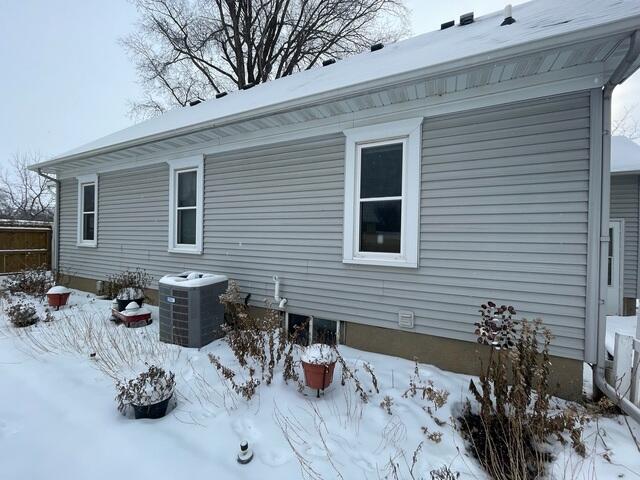 Before: Our Design Specialist, Justin, recommended installing a Radon Mitigation System outside the home.