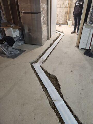 During: Our Foreman, Juan, and his crew successfully secured all the products in the basement.