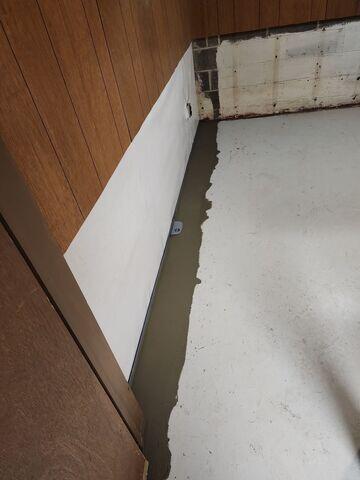 WaterGuard is an interior drainage system designed to capture water at the wall and floor joint and safely direct it away before it can spread across the basement floor.