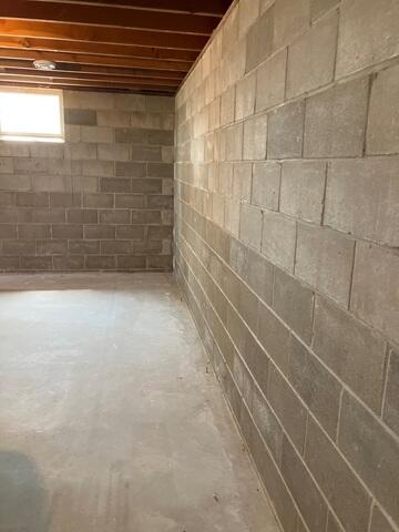 Before: Our Design Specialist, Eric, suggested waterproofing the entire basement.