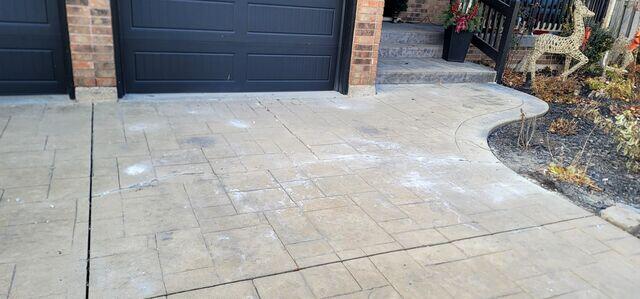 Deep cracks stretching across the pattern, a sure sign that the soil underneath has shifted or washed away.