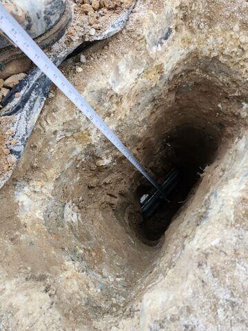 During: Our Foreman, Lane, and his crew secured three GeoLock Wall Anchors along the struggling wall.