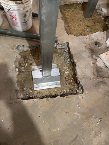 During: Our Foreman, Jesus, and his crew succesfully installed 10 SmartJacks along the damaged floors.