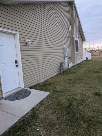 Before: Our Design Specialist, James, recommended securing the Radon Mitigation System outside of the home.