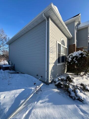 Before: Our Design Specialist, Ian, recommended securing a Radon Mitigation System outside the home.