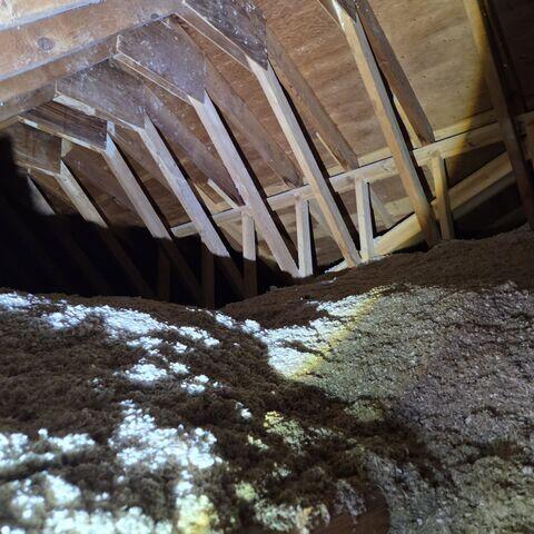 Before: Brad, one of our Design Specialists, recommended securing the Radon Mitigation System in the attic.
