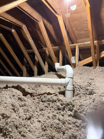 During: Our Foreman, Gustavo, and his crew worked hard to secure the system inside their attic.