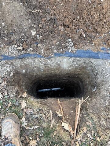 During: Our Foreman, Juan, and his crew secured the five GeoLock Wall Anchors along the damaged walls.