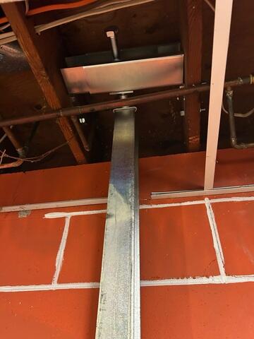 During: Our crew secured the PowerBraces on the cracked walls.