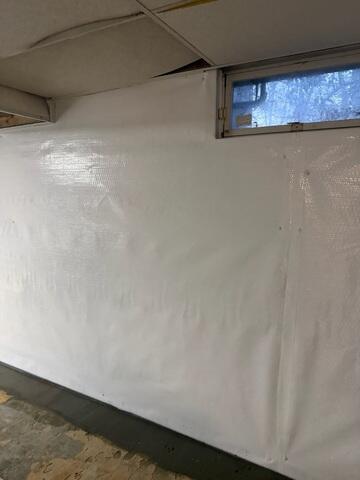 CleanSpace Wall Panels were installed to create a durable, moisture-resistant barrier along the basement walls.