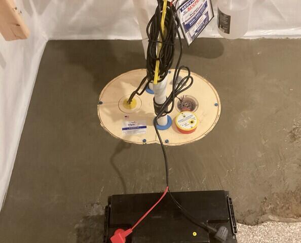 The TripleSafe sump pump will send all of the collected water out of the basement through the two discharge lines.