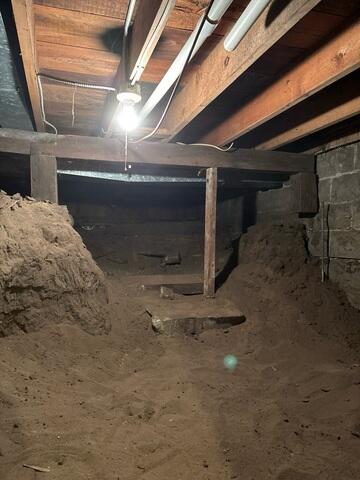 Before: Our Design Specialist, Chuck, recommended installing two SmartJacks under the sinking floors.