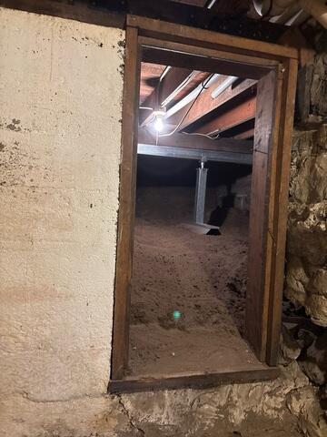 During: Our Foreman, Juan, and his crew successfully secured the SmartJacks in the crawl space.
