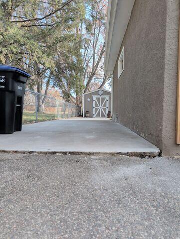 During: Our crew successfully lifted the sidewalk back into place.