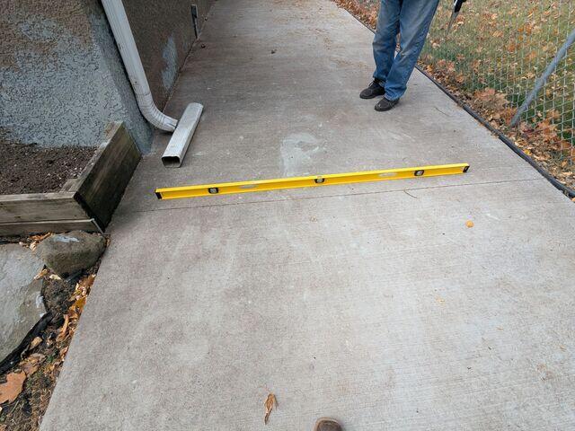 Before: The homeowner worried that their unlevel sidewalk was going to become a tripping hazard.