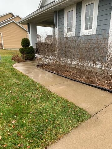 During: Our Foreman, Dylon, and his crew successfully lifted the sidewalk back into place.