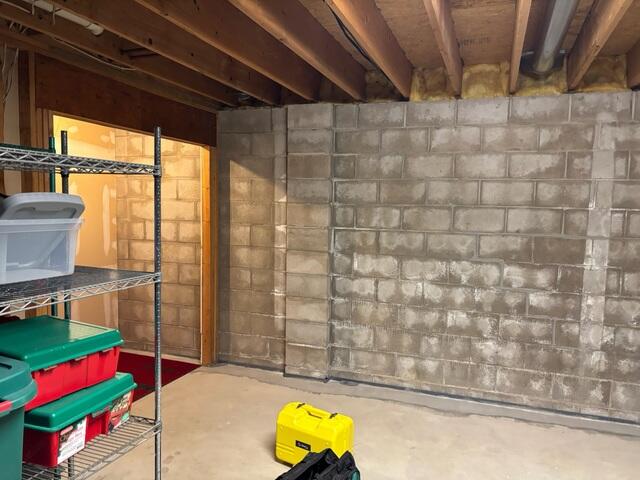 Before: Daniel, one of our Design Specialists, recommended installing GeoLock Wall Anchors on the damaged wall.