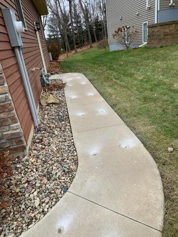 During: Our Foreman, Dylon, and his crew succesfully secured the PolyLevel below the damaged sidewalk.