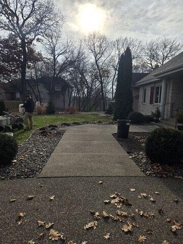 During: Sam, our Foreman, and his crew succesfully lifted and replaced the joints in the sidewalk.