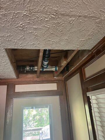 The water drainage line leaked in the ceiling of a Lilburn, Georgia property.