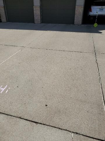 During: Our Foreman and his crew secured the PolyLevel below the sinking driveway.