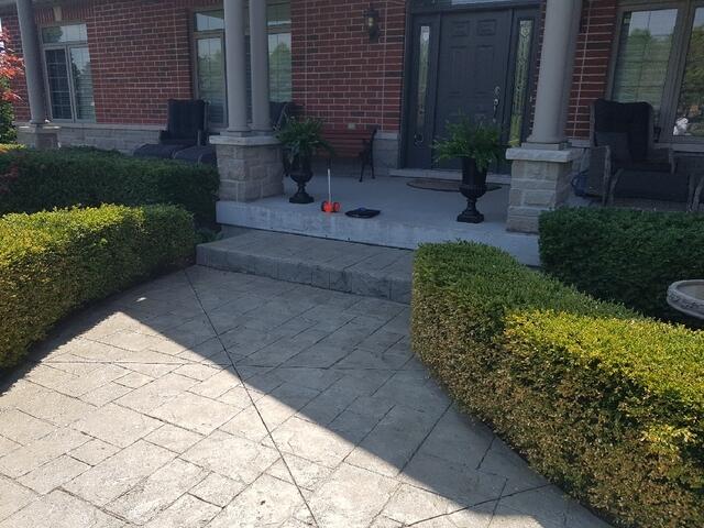 The complete view of the Hampton residence, highlighting how the walkway settlement affected the overall look of the home's main entrance. Our process aims to restore this curb appeal without any heavy construction.