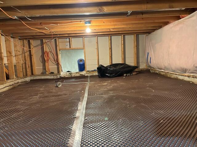 During: Our Foreman, Raul, and his crew succesfully secured the products in the crawl space.