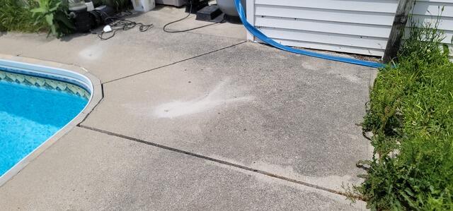 Sinking concrete is usually a sign of hidden voids. We stabilized this Oro-Medonte pool deck by filling the empty pockets underground and "floating" the slab back into its original position. No demolition required.