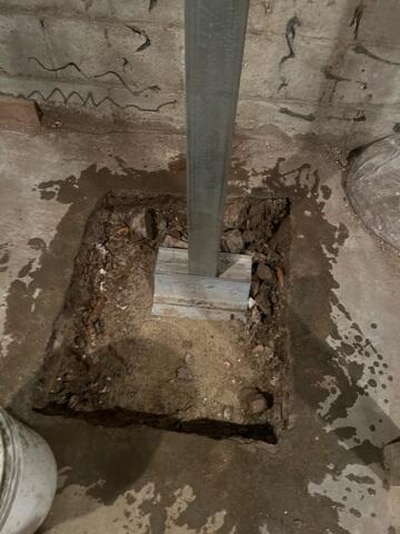 During: Our Foreman, Kiko, and his crew secured the SmartJacks around the struggling basement.