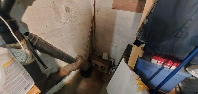 Before: Our Design Specialist, Chuck, recommended securing waterproofing products throughout the basement.