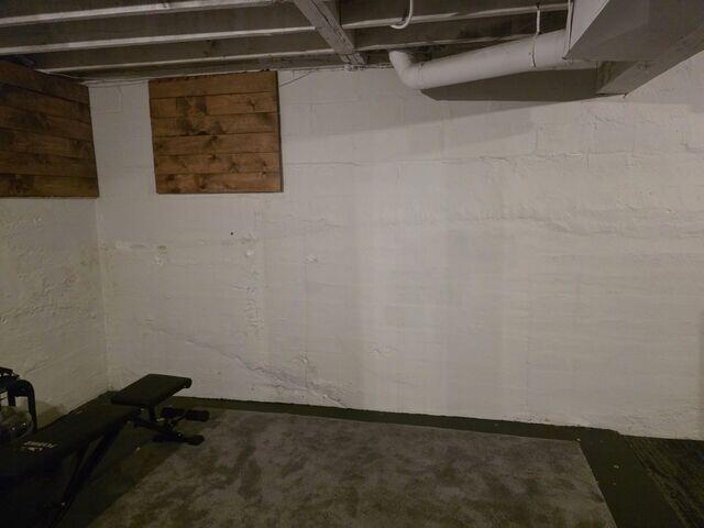 Before: Our Design Specialist, Darin, recommended securing waterproofing products throughout the basement.