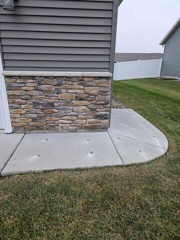 During: Our Foreman and his crew successfully injected all the PolyLevel below the sinking walkway and driveway.