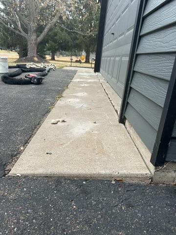During: Ryan, our Foreman, and his crew successfully repaired the damaged exterior concrete.