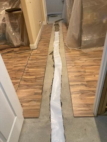 During: Our Foreman, Emmanuel, and his crew worked hard to secure all the waterproofing products throughout the basement.