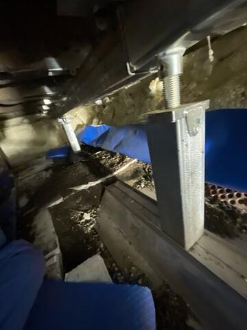 During: Our Foreman, Victor, and his crew succesfully secured three SmartJacks along the struggling support beams.