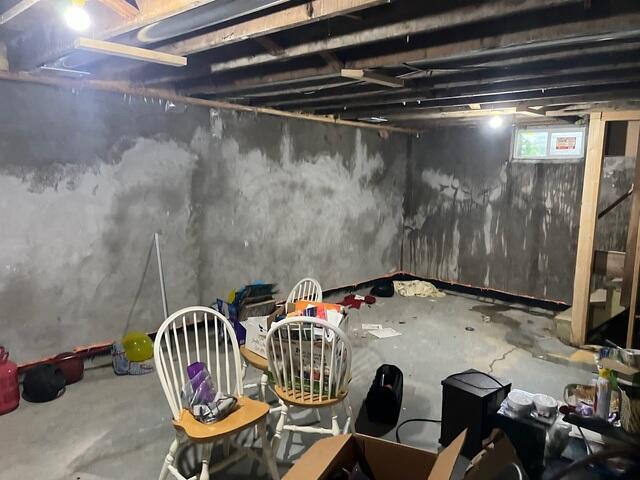 Before: Our Design Specialist recommended waterproofing the entire basement.
