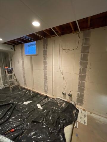 During: Our Foreman, Victor, and his crew worked hard to secure the PowerBraces on the damaged foundation walls.