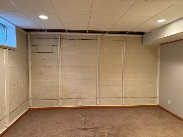 Before: Our Design Specialist, Dustin, recommended stabilizing the cracked and separating walls.