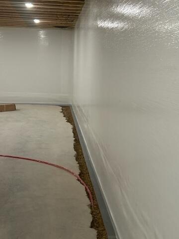 During: Our Foreman, Kiko, and his crew secured all the products throughout the basement.