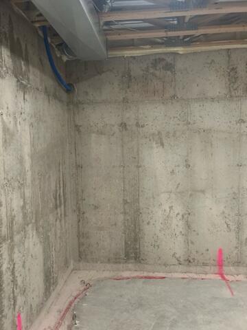 Before: Dustin, one of our Design Specialists, recommended securing waterproofing products throughout the basement.