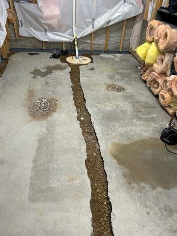 During: Our Foreman, Kevin, and his crew worked hard to secure the products throughout the basement.