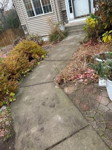 During: Our Foreman, Patrick, and his crew injected PolyLevel below the sinking slabs.