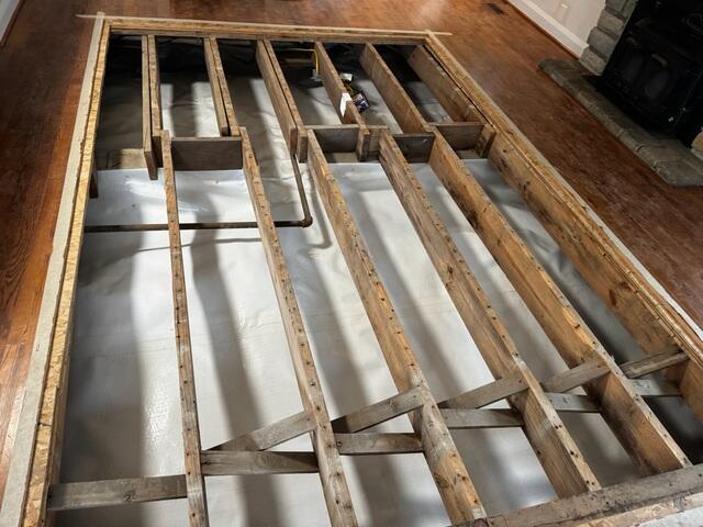 A look at the finished encapsulation before the crew re-installed the subfloor.
