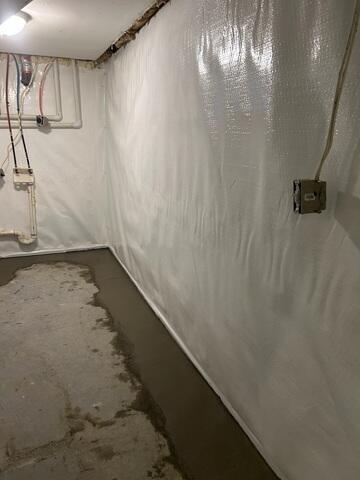 During: Our Foreman, Matt, and his crew worked hard to secure the waterproofing products throughout the basement.