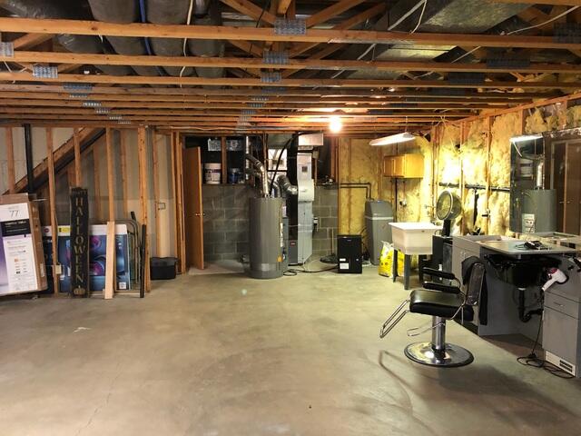 Before: Our Design Specialist recommended waterproofing the exterior and replacing the out-of-date sump pump.