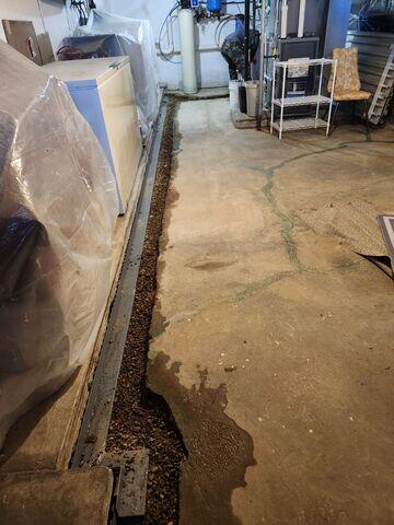 During: Our Foreman, Lane, and his crew successfully secured all the products in the basement.